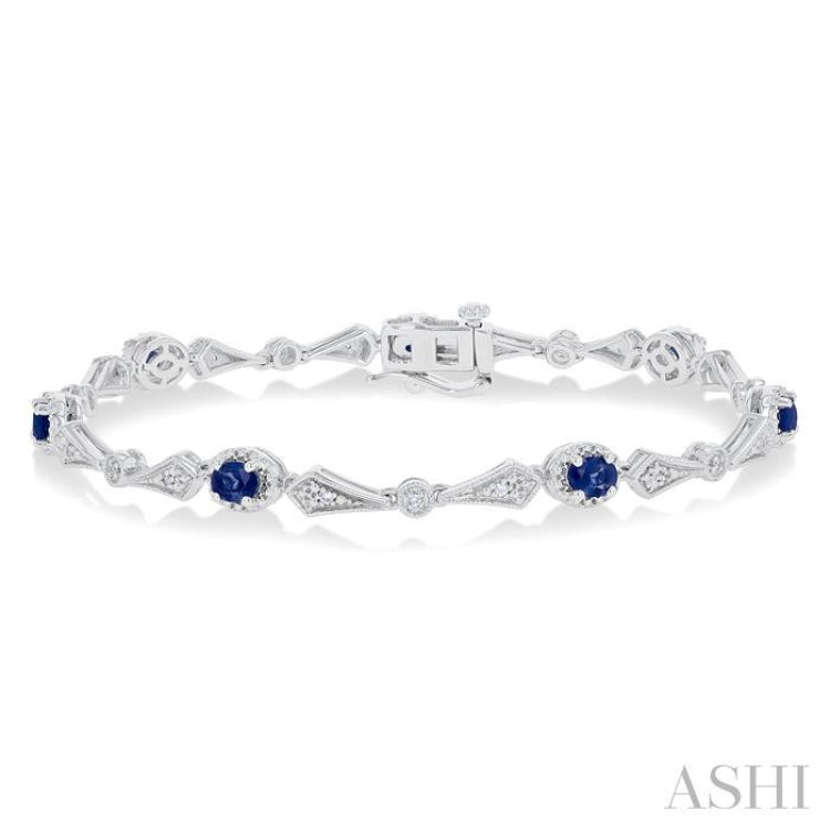 4X3 MM Oval Cut Sapphire and 1/10 Ctw Round Cut Diamond Precious Bracelet in 10K White Gold
