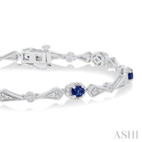 4X3 MM Oval Cut Sapphire and 1/10 Ctw Round Cut Diamond Precious Bracelet in 10K White Gold