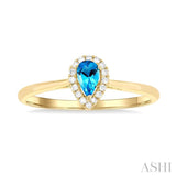 5x3 MM Pear Shape Blue Topaz and 1/20 ctw Single Cut Diamond Halo Semi Precious Ring in 10K Yellow Gold