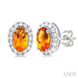 5x3 MM Oval Shape Citrine and 1/8 Ctw Single Cut Diamond Halo Semi-Precious Stud Earrings in 14K White Gold