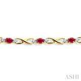 4x3 MM Oval Cut Ruby and 1/10 Ctw Single Cut Diamond Bracelet in 10K Yellow Gold