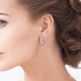 1/20 Ctw Round Cut Diamond Fashion Earrings in Sterling Silver