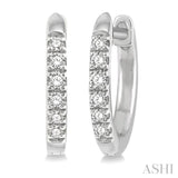 1/8 ctw Round Cut Diamond Huggie Petite Earrings in 10K White Gold