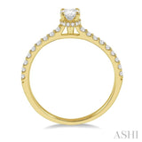 1/2 ctw Round Cut Diamond Engagement Ring With 1/4 ct Oval Cut Center Stone in 14K Yellow Gold