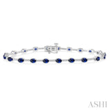 4x3 MM Oval Cut Sapphire and 1/3 Ctw Round Cut Diamond Precious Bracelet in 10K White Gold