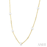 1/6 Ctw 4 MM Cultured Pearl and Round Cut Diamond Station Necklace in 14K Yellow Gold