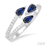 5X3MM Pear Cut Sapphire and 1/4 ctw Round Cut Embraced 3-Stone East-West Set Diamond Precious Open Fashion Ring in 14K White Gold