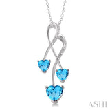 5&7 mm Heart Shape Blue Topaz and 1/50 ctw Single Cut Diamond Pendant in Sterling Silver with Chain