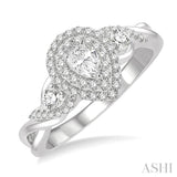 5/8 ctw Split Twisted Shank Round Cut Diamond Engagement Ring With 1/4 ctw Pear Cut Center Stone in 14K White Gold